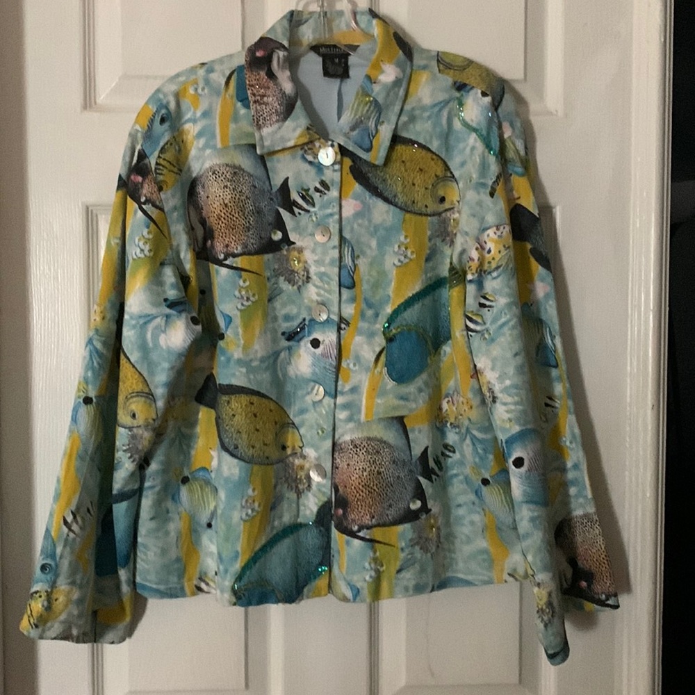 Multiples jacket with fish pattern sequence.